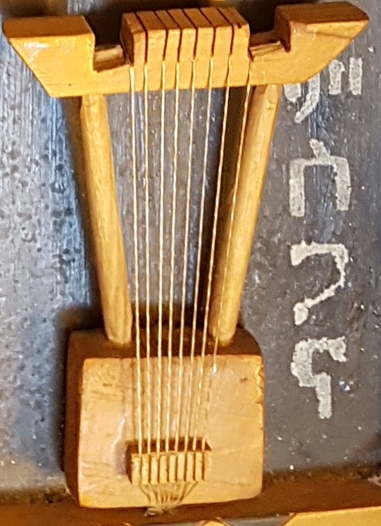  photo of artwork depicting the traditional  Ethiopian musical instrument the  krar